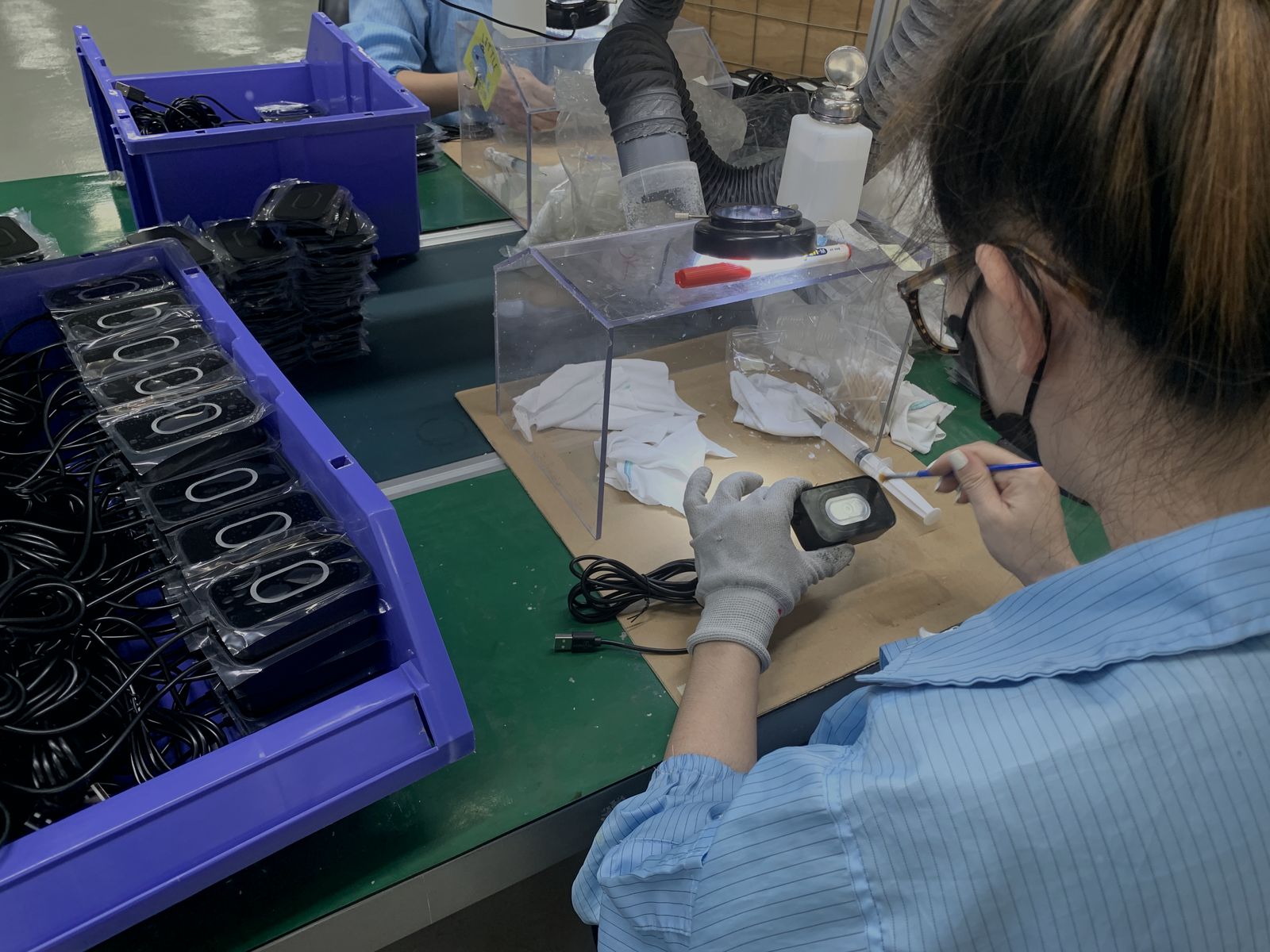Technician inspecting an assembly