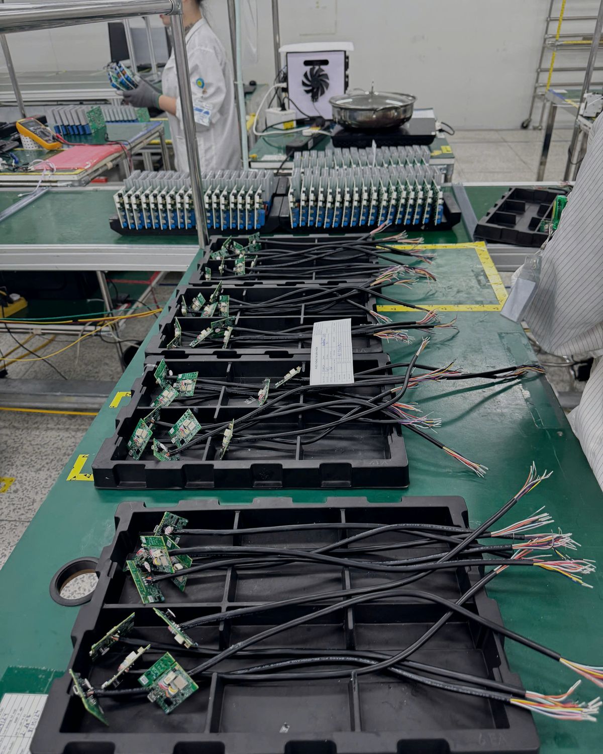 Prototype boards wired up on an engineering bench