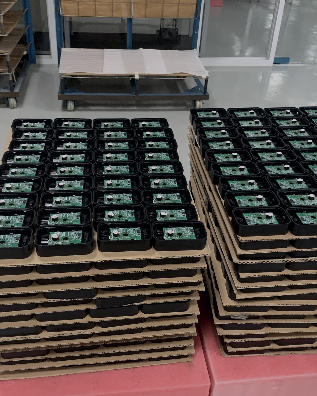 Trays of finished electronic assemblies ready for shipment