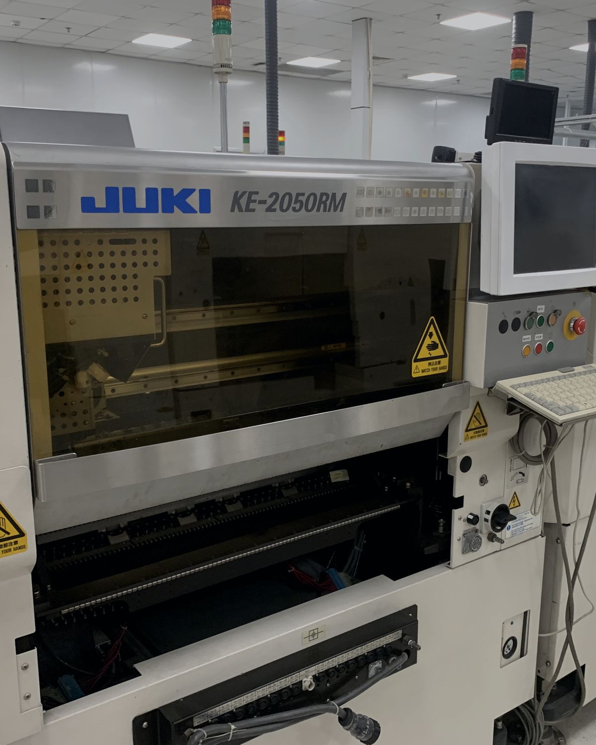 JUKI SMT placement machine on the Meritronics production floor