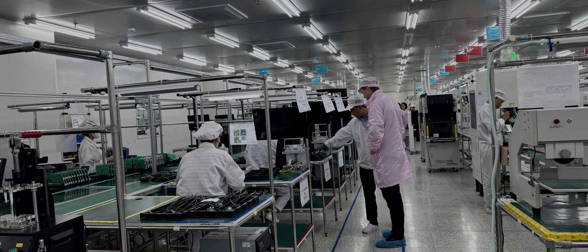 Operators on a Meritronics assembly line